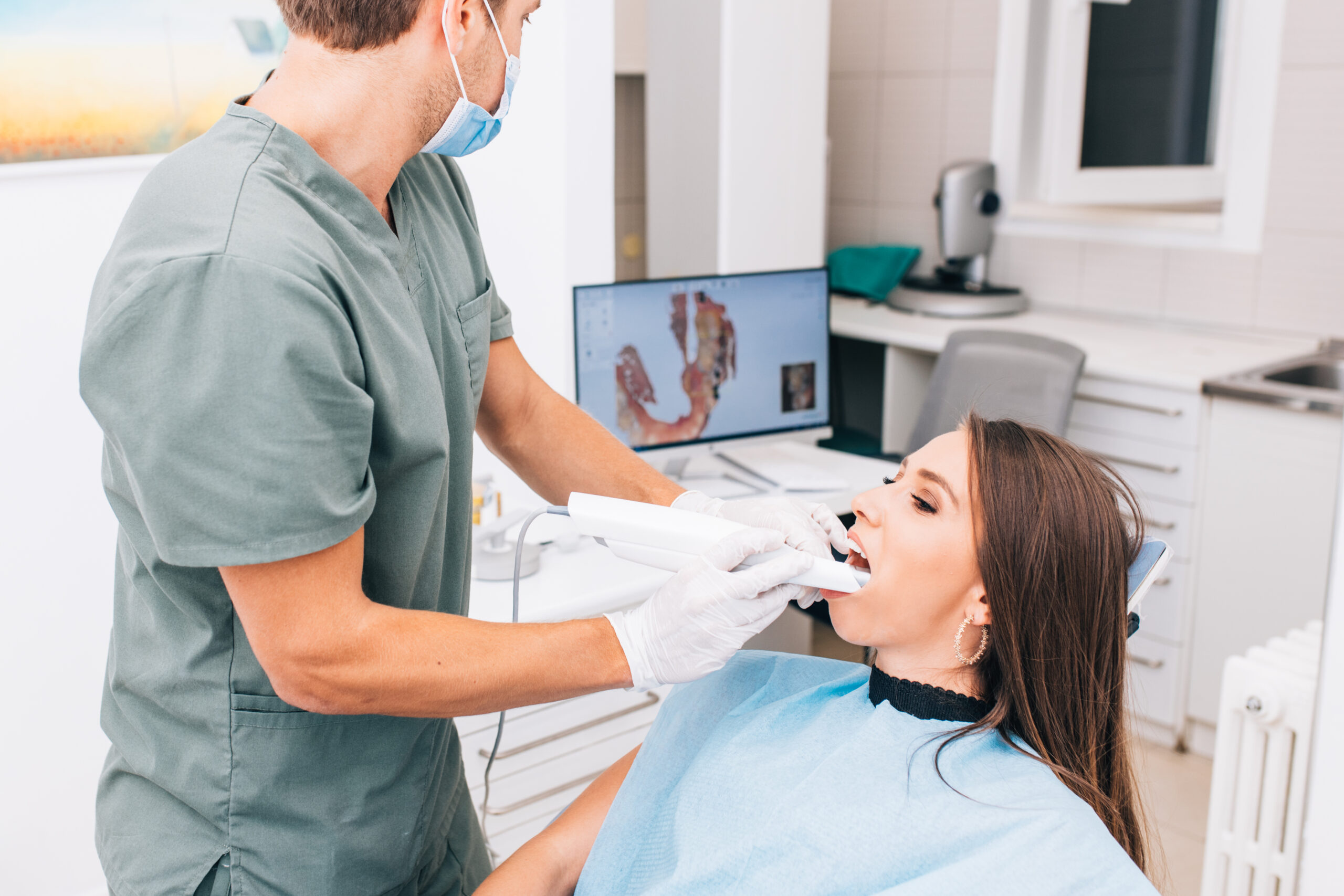 The,Dentist,Scans,The,Patient's,Teeth,With,A,3d,Scanner.