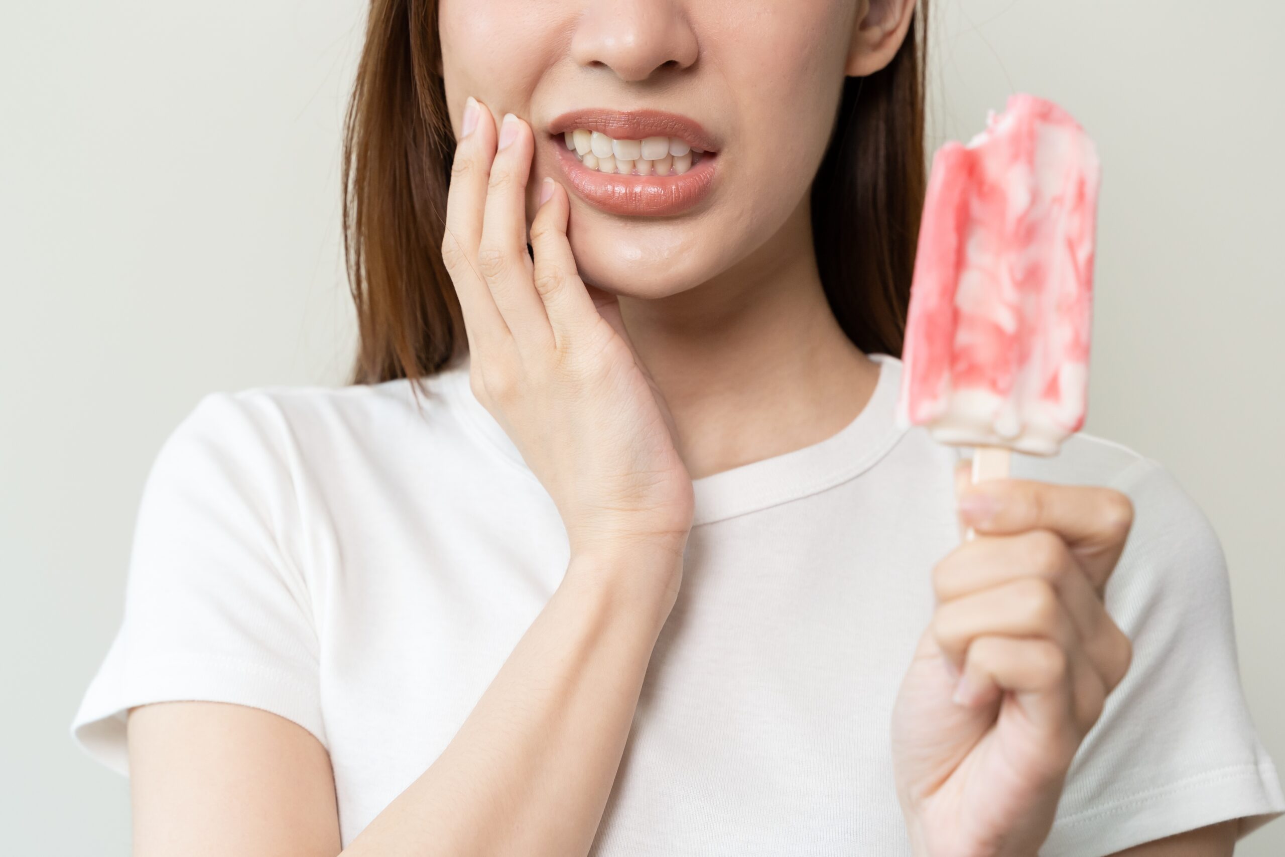 Face,Expression,Suffering,From,Sensitive,Teeth,,Asian,Young,Woman,Touching