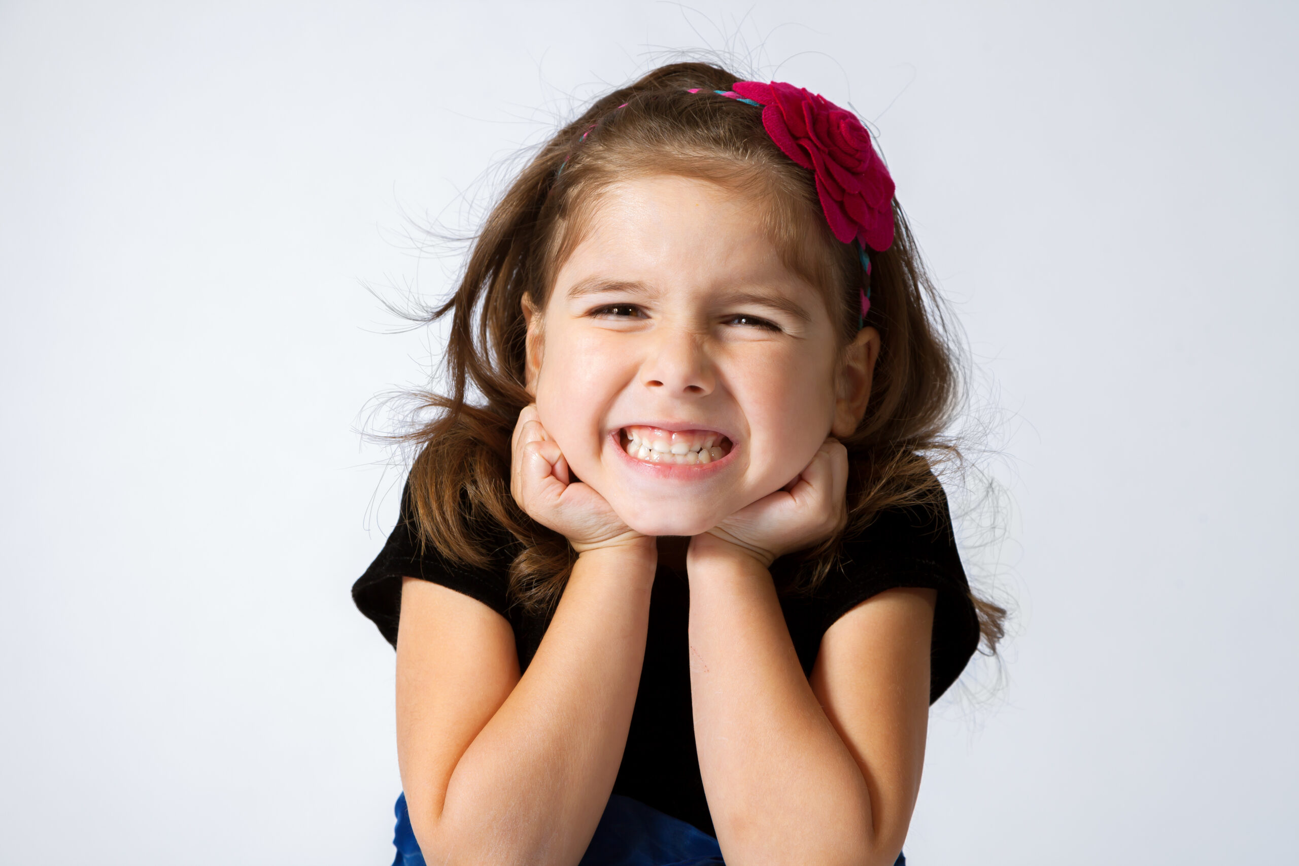 Adorable,And,Expressive,Girl,Gritting,Her,Teeth,And,Scrunching,Her